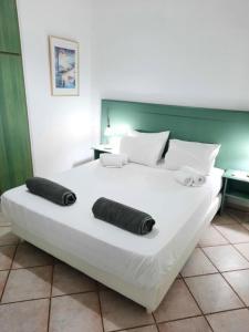 Posteľ alebo postele v izbe v ubytovaní Panorama Apartments Fiscardo