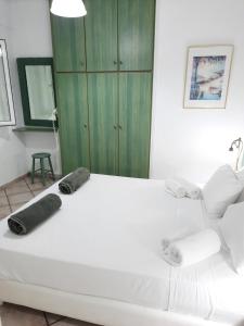 Posteľ alebo postele v izbe v ubytovaní Panorama Apartments Fiscardo