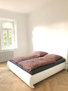 Postel nebo postele na pokoji v ubytování Villa Elisabeth