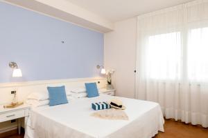 Postel nebo postele na pokoji v ubytování Oleandri Resort Paestum