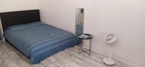 Ένα ή περισσότερα κρεβάτια σε δωμάτιο στο Un Studio Premium tout à nouveau rénové, centre ville