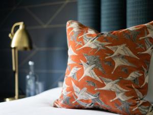 Letto o letti in una camera di Clandeboye Lodge Hotel