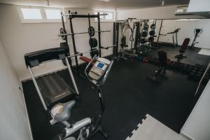 an overhead view of a gym with weights at Malo More Resort in Trogir