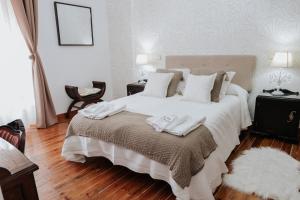 Posteľ alebo postele v izbe v ubytovaní Casa Rural El Puente Grande