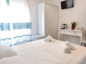 Letto o letti in una camera di HORIZON