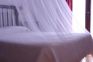 A bed or beds in a room at La Casa de la Estación