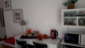 A kitchen or kitchenette at My b&b - Strada Vecchia del Pinocchio 3/B