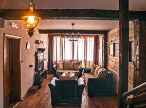 Posezení v ubytování Holiday Home Drijenak