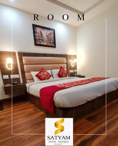 Postel nebo postele na pokoji v ubytování Satyam Room