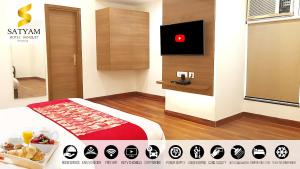 TV a/nebo společenská místnost v ubytování Satyam Room