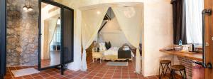 A bed or beds in a room at Ölüdeniz Loft - Adults Only