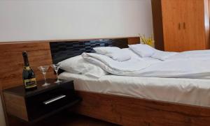 Posteľ alebo postele v izbe v ubytovaní Relax Apartman Siófok-Sóstó