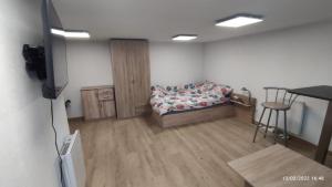 Postel nebo postele na pokoji v ubytování Studio Deluxe Marc - hébergement de tourisme classé avec parking gratuit