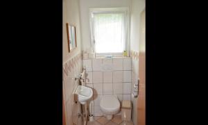 Koupelna v ubytování Haus Dachstein Schnitzer