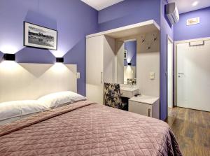 Postel nebo postele na pokoji v ubytování Hotel Le Pont