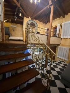 a set of stairs in a room with a stair case at The House by the River Luxury Villa in Veria