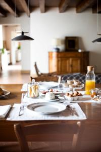 a table with plates of food on top of it at San Calisto camere con vigna in Popoli