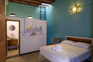 Voodi või voodid majutusasutuse Casa Tunido toas