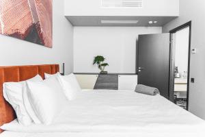 Loop Hotel Vilnius 객실 침대
