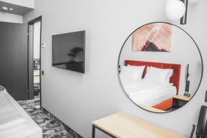 Loop Hotel Vilnius 객실 침대