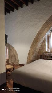 Postel nebo postele na pokoji v ubytování Hotel Tugasa Convento San Francisco
