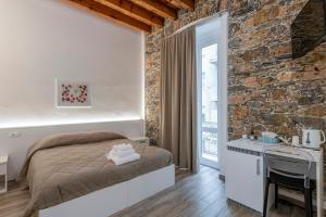 Postel nebo postele na pokoji v ubytování La casa di Mattia