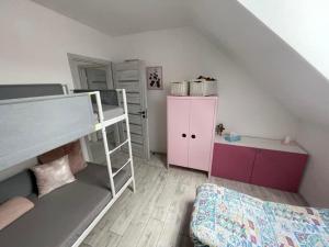 Postel nebo postele na pokoji v ubytování Apartmán Sadová