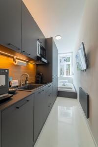 A kitchen or kitchenette at josef's home I Studio Mini I near UNO & VIC