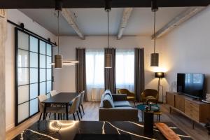 Телевизор и/или развлекательный центр в PISO DE DISEÑO CON VISTAS A LA RIA.