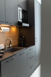 A kitchen or kitchenette at josef's home I Studio Mini I near UNO & VIC