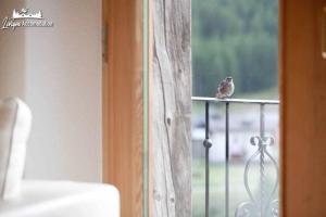 A balcony or terrace at Appartamenti Green by Livigno Accomodation
