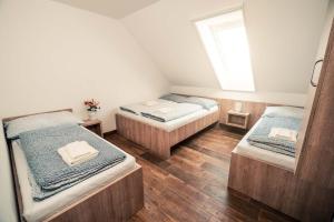 Postel nebo postele na pokoji v ubytování Štěpánské sklepy Mutěnice - Dolní sklep
