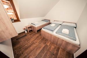 Postel nebo postele na pokoji v ubytování Štěpánské sklepy Mutěnice - Dolní sklep