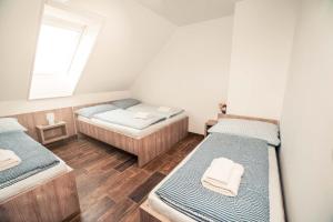 Postel nebo postele na pokoji v ubytování Štěpánské sklepy Mutěnice - Dolní sklep
