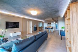 Μια τηλεόραση ή/και κέντρο ψυχαγωγίας στο Villa Catleya Appart Hôtel