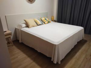 Łóżko lub łóżka w pokoju w obiekcie Duerming Park Viveiro