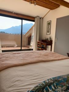 En eller flere senge i et værelse på A Muvrella