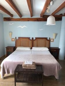 Postel nebo postele na pokoji v ubytování Casa rural Laguna Herrera