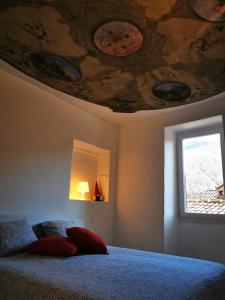 Postel nebo postele na pokoji v ubytování Ca' Sistina Red + 11 fotografií