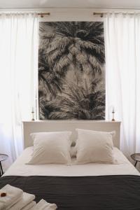 מיטה או מיטות בחדר ב-Maison d'Hotes Delga