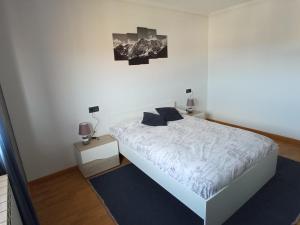 A bed or beds in a room at VuT EL NEGRILLO 15 VUT-LE-413