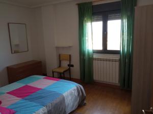A bed or beds in a room at VuT EL NEGRILLO 15 VUT-LE-413