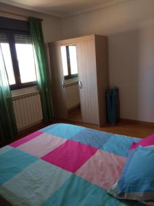 A bed or beds in a room at VuT EL NEGRILLO 15 VUT-LE-413