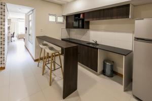 Eldhús eða eldhúskrókur á Asuncion Rent Suites Centro