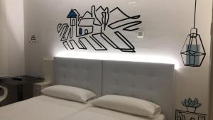 Posteľ alebo postele v izbe v ubytovaní Hostal Misericordia