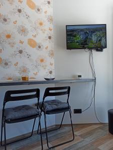 Een TV en/of entertainmentcenter bij Apartman Studio LASTIN PUT Divčibare
