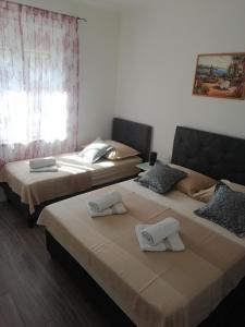 Postel nebo postele na pokoji v ubytování Apartment All 4 You