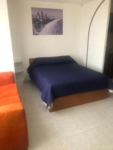 Postel nebo postele na pokoji v ubytování Apt estudio calle97301