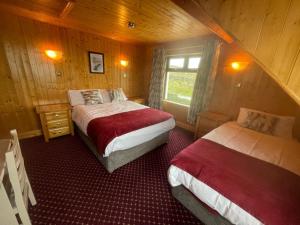 Postel nebo postele na pokoji v ubytování Ard Einne House Bed & Breakfast