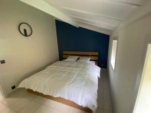 Un ou plusieurs lits dans un hébergement de l'établissement vakantiehuis nieuwendamme